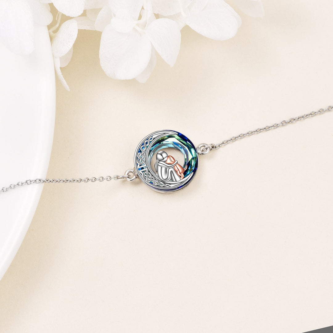 Adjustable sterling silver bracelet with a dog charm