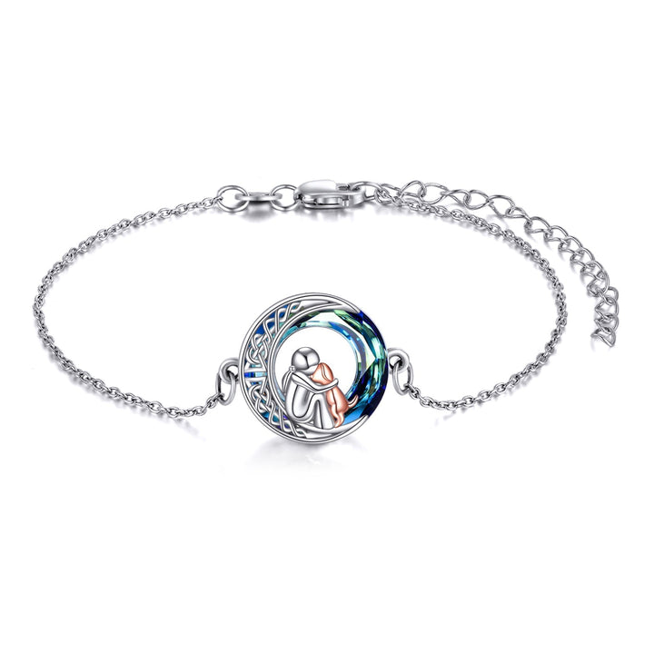 Adjustable sterling silver bracelet with a dog charm