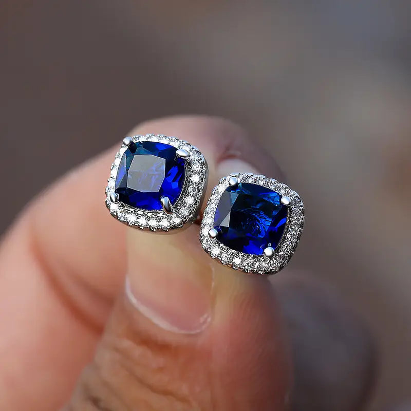 Eleganckie srebrne kolczyki w stylu halo z szafirem