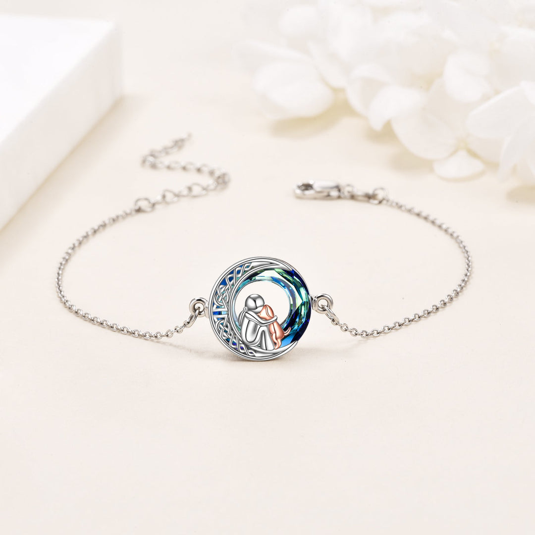Adjustable sterling silver bracelet with a dog charm