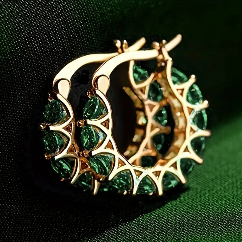Gold checkered hoop earrings with emeralds