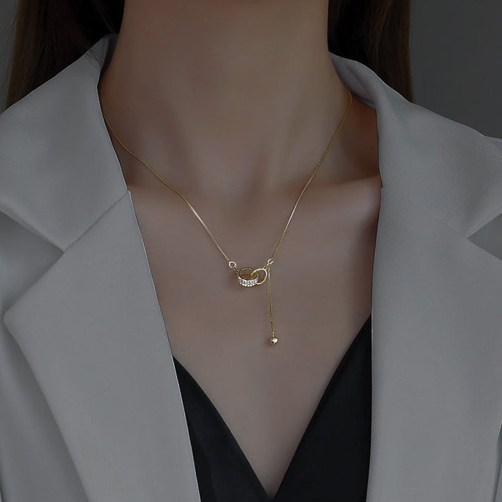 Janna Złoty naszyjnik z elegancką frędzlą