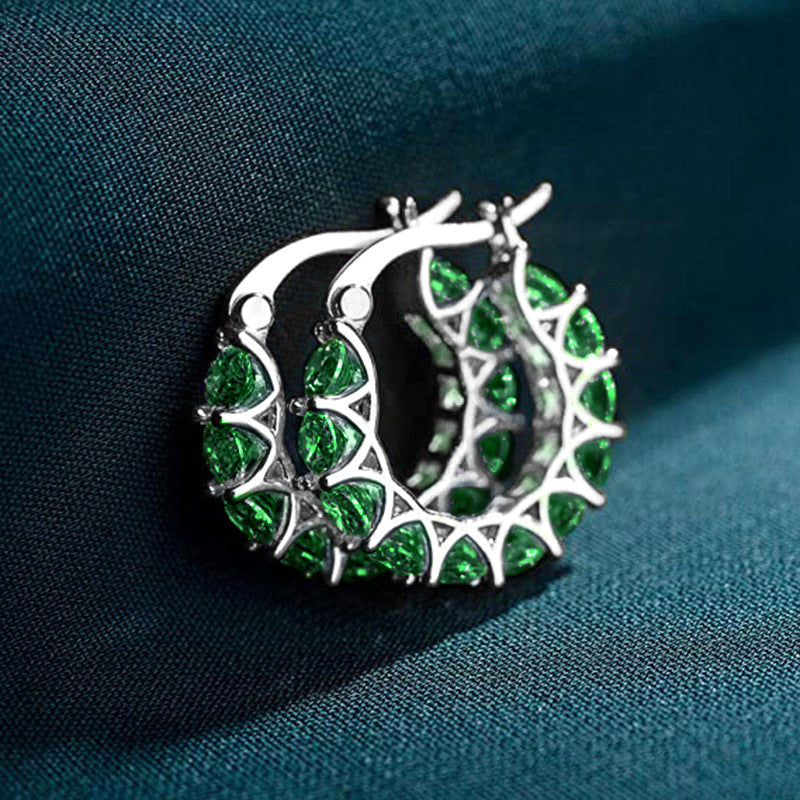 Gold checkered hoop earrings with emeralds