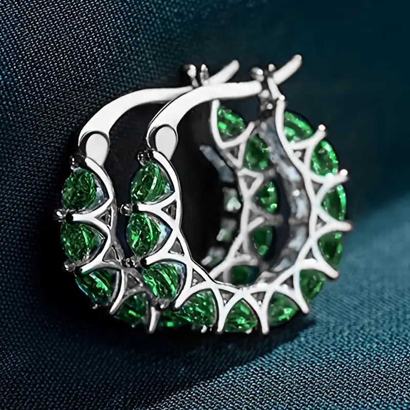 Gold checkered hoop earrings with emeralds