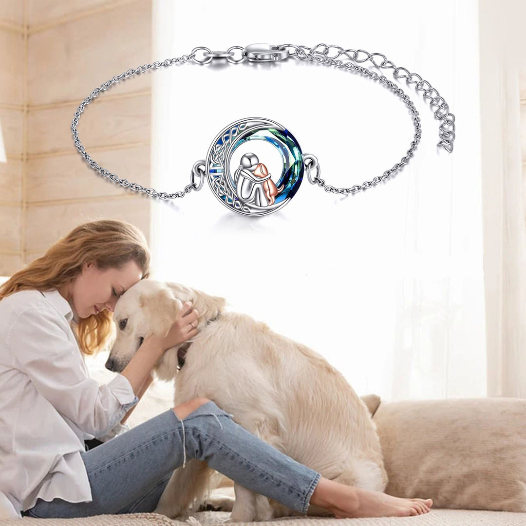 Adjustable sterling silver bracelet with a dog charm