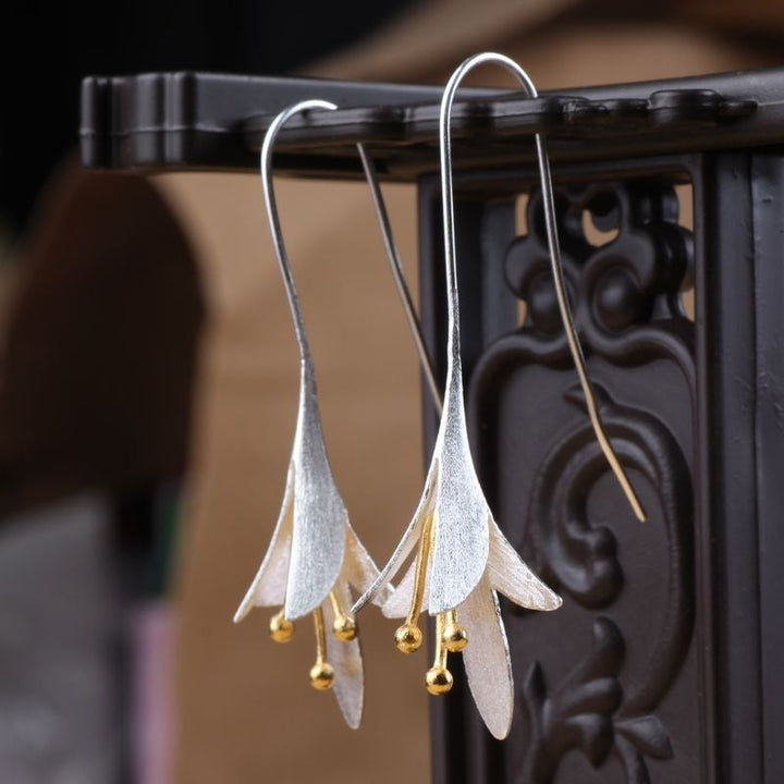 Unique silver earrings in a floral design