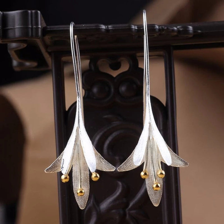 Unique silver earrings in a floral design