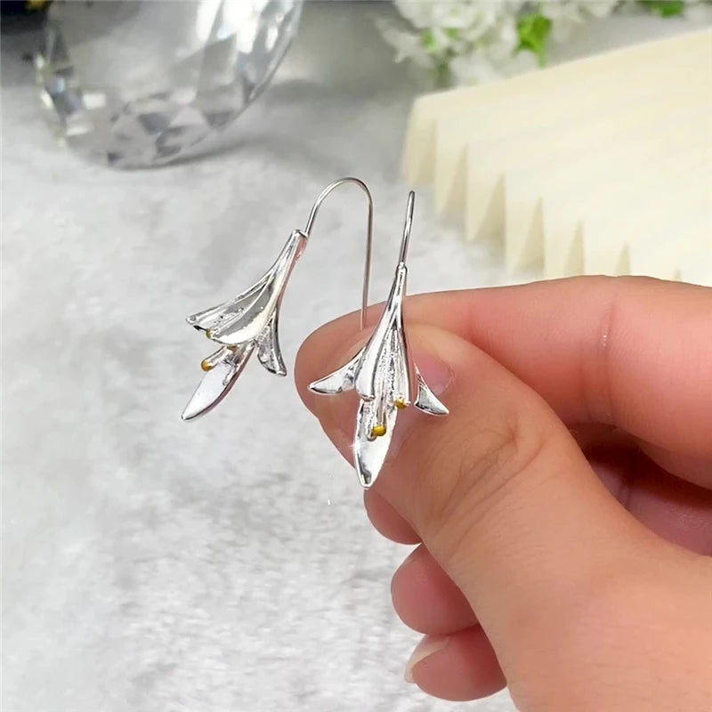 Unique silver earrings in a floral design