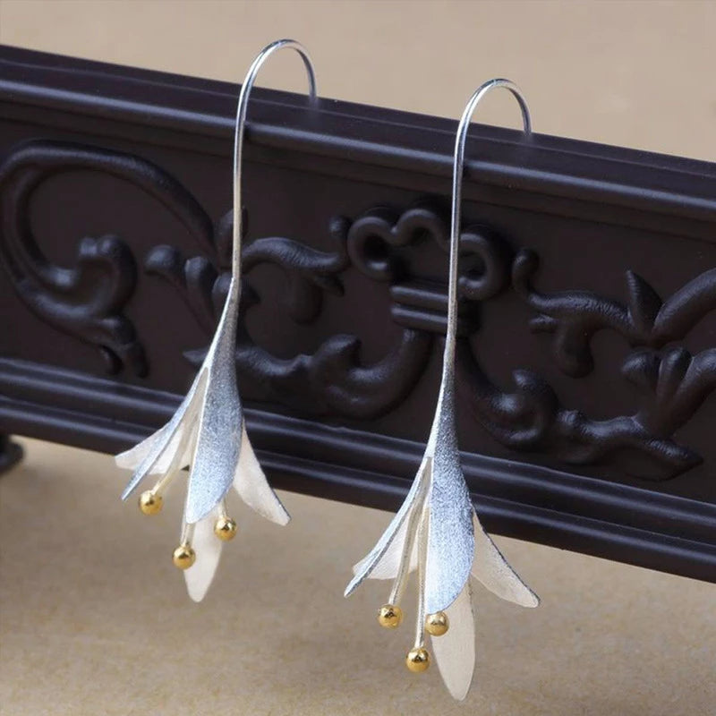 Unique silver earrings in a floral design