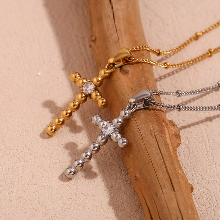 RETRO BUBBLES CROSS NECKLACE