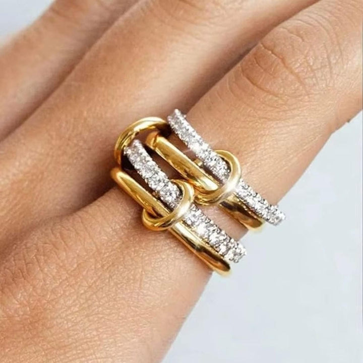 Set of intertwined rings with zircons